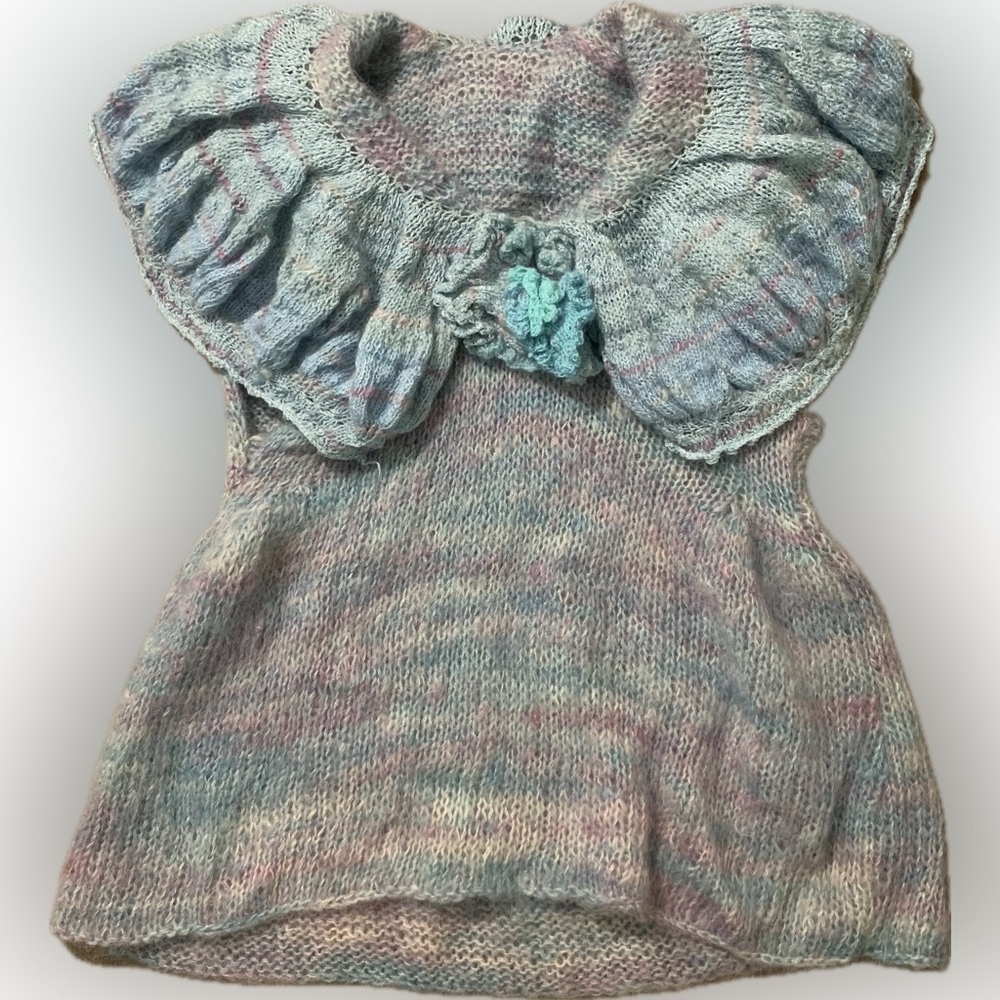 Wacky wild blue and purple loose knit top with floral collar